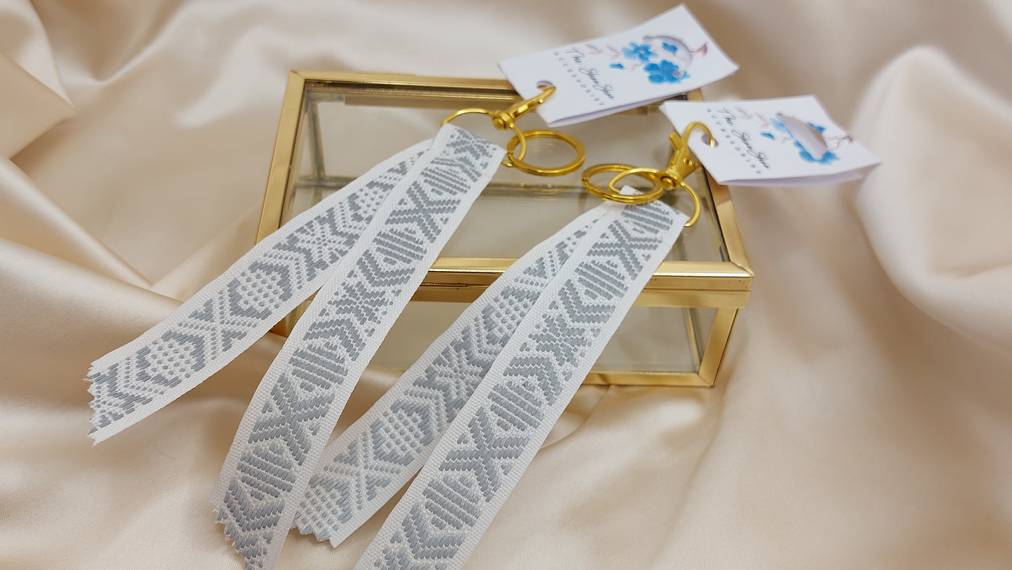 Nyckelring med reflexband och nyckelkrok vit