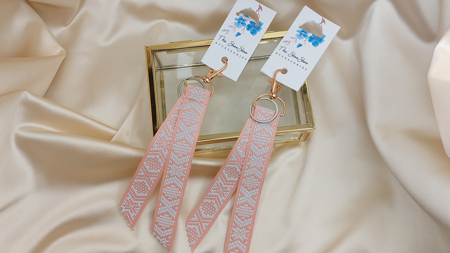 Nyckelring med reflexband och nyckelkrok rosa